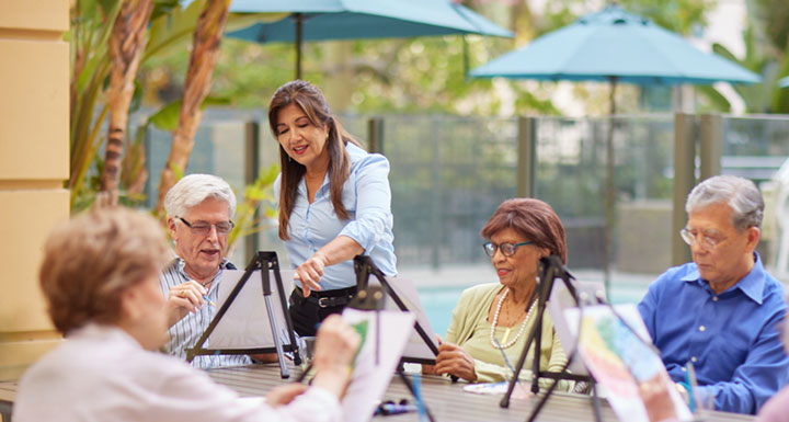 Belmont Village Memory Care painting activity